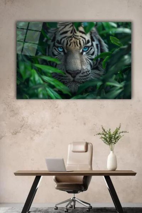White Tiger With Blue Eyes Peeking Through Jungle Leaves Poster