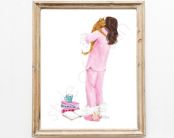 Brunette in Pink Pajamas Hugging Ginger Cat with Books and Tea Poster