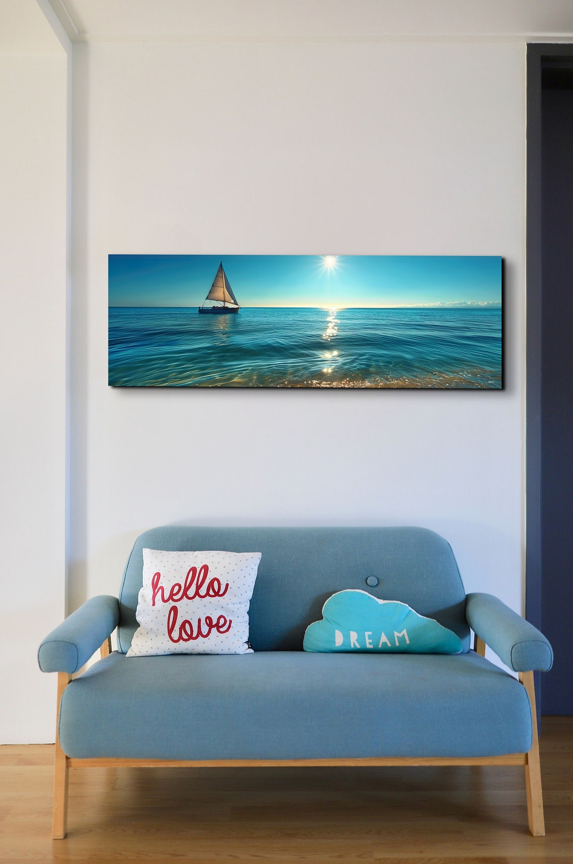 Serene Lone Sailboat Gliding Over a Calm Sunlit Blue Ocean Poster - Image 4