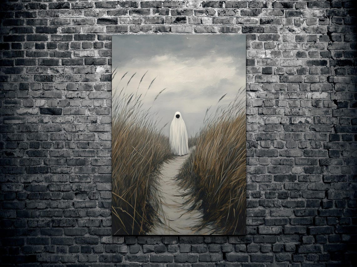 Lone Ghost Walking a Windswept Beach Dune Path Under Cloudy Sky Poster - Image 2