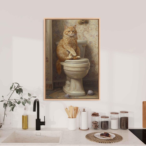 Cute Orange Cat Playing With Yarn Balls On Vintage Toilet Poster