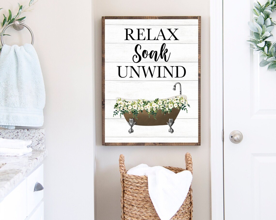 Relax Soak Unwind Bronze Clawfoot Tub With White Floral Decor Poster