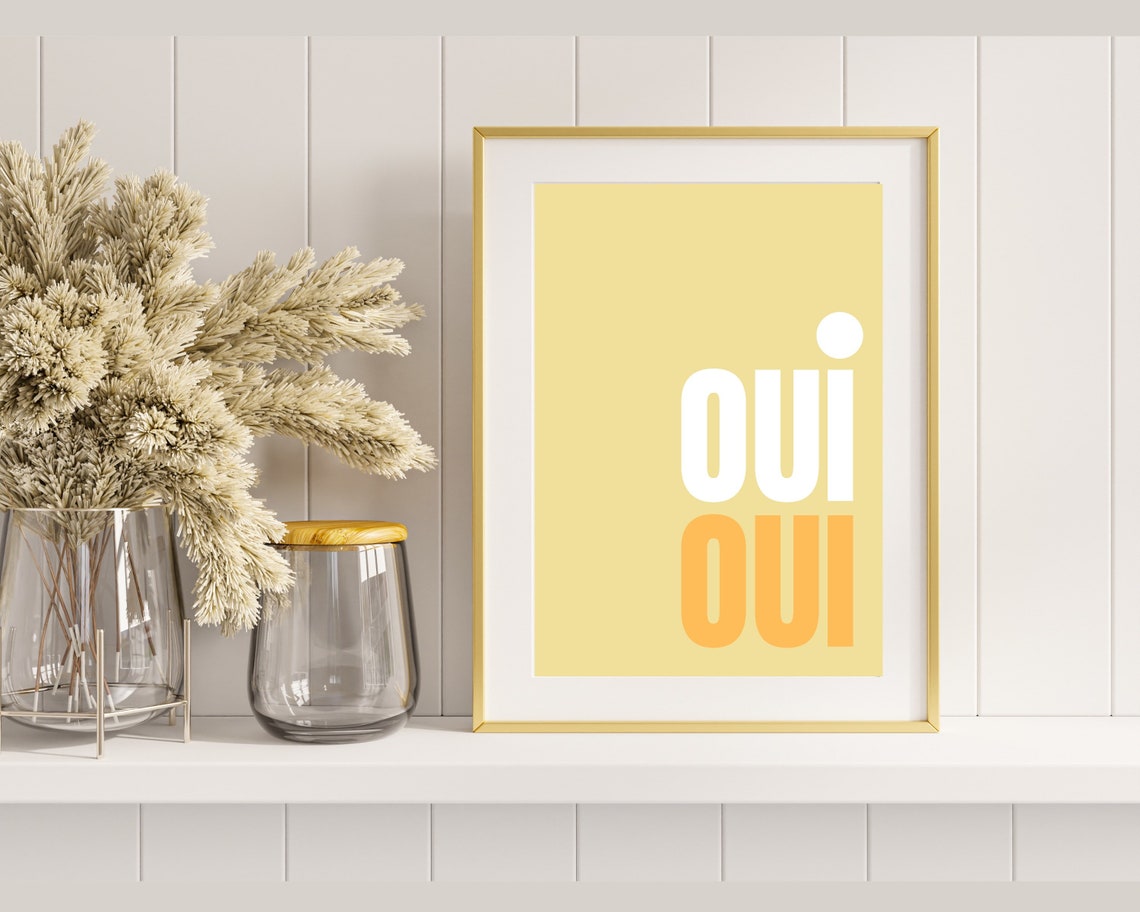 Oui Oui Typography Poster In White And Orange On A Yellow Wall - Image 3