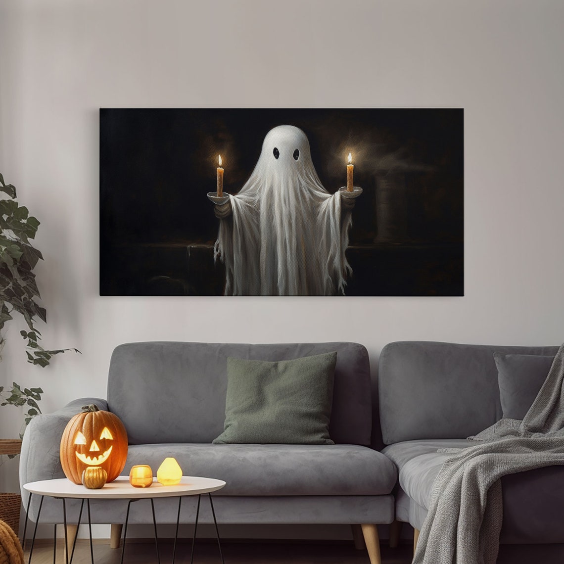 Cute Ghost Holding Two Lit Candles Against Black Background Poster - Image 3