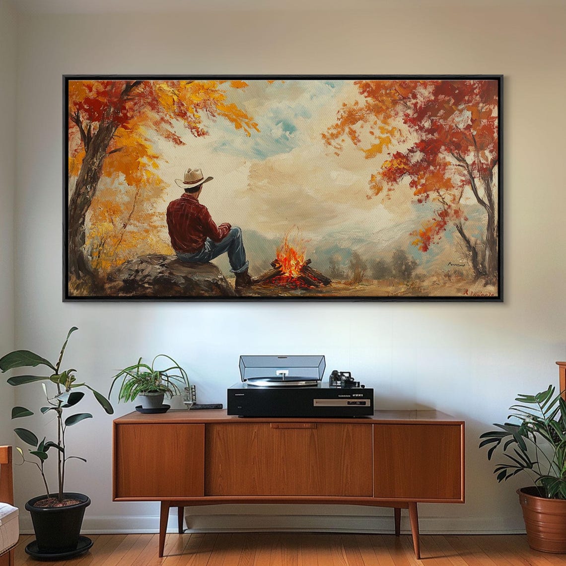 Cowboy Sitting By A Campfire With Autumn Mountains Behind Art Print