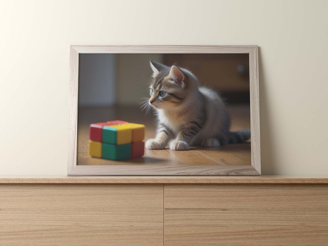 Blue Eyed Tabby Kitten With A Small Rubiks Cube On Wood Poster - Image 2