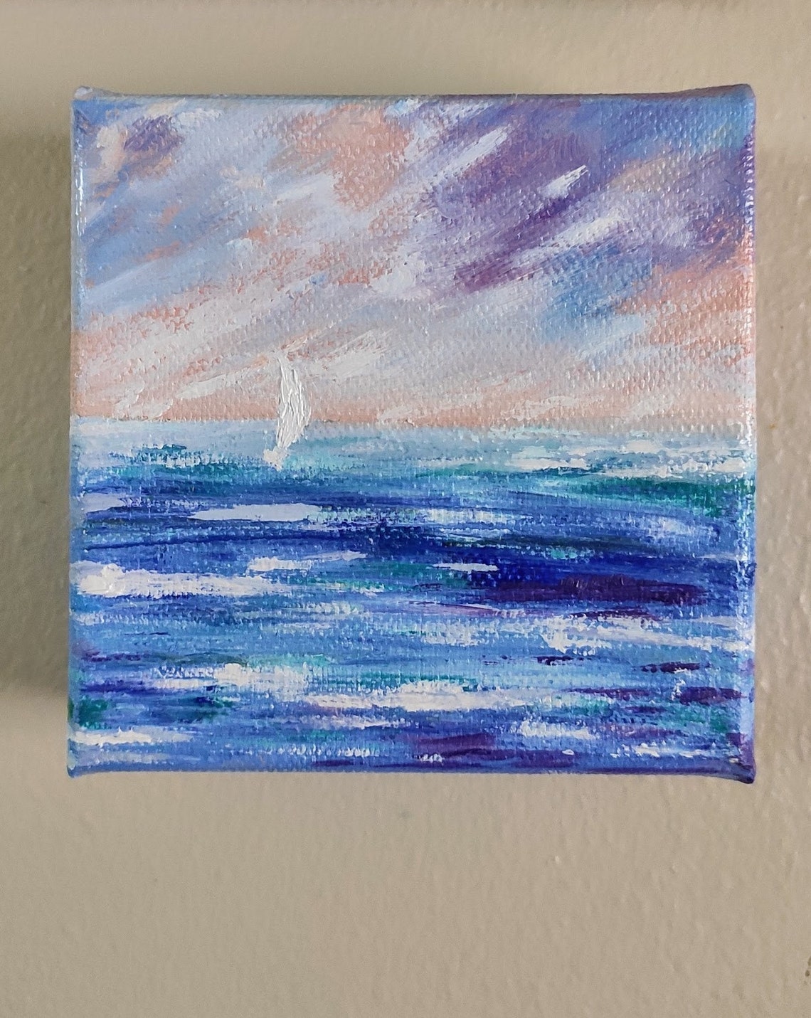 Tiny Sailboat Under Lavender Pink Dawn Sky On Blue Waves Art Poster - Image 3