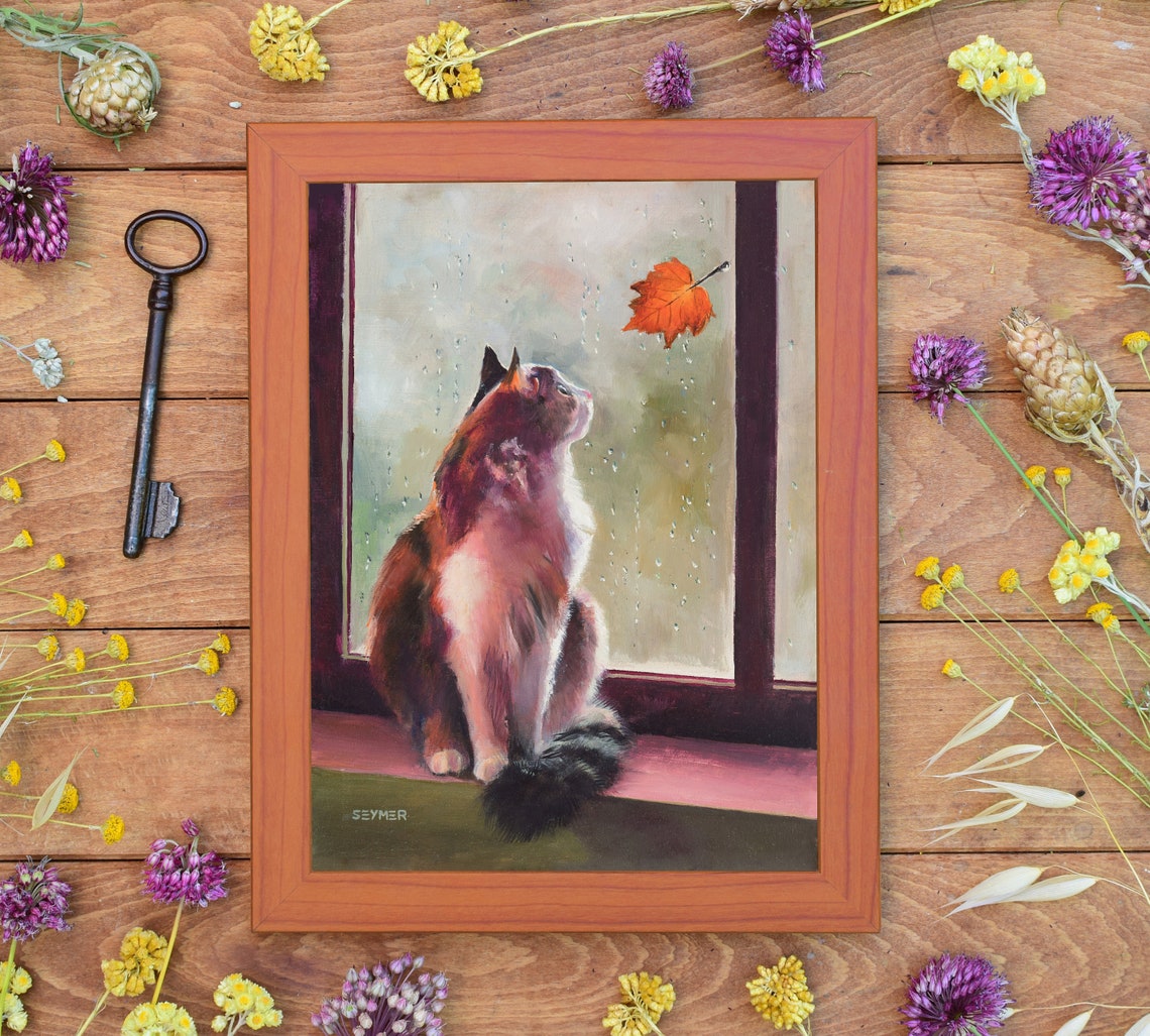 Cat Watching an Orange Maple Leaf on a Rainy Windowpane Poster - Image 2