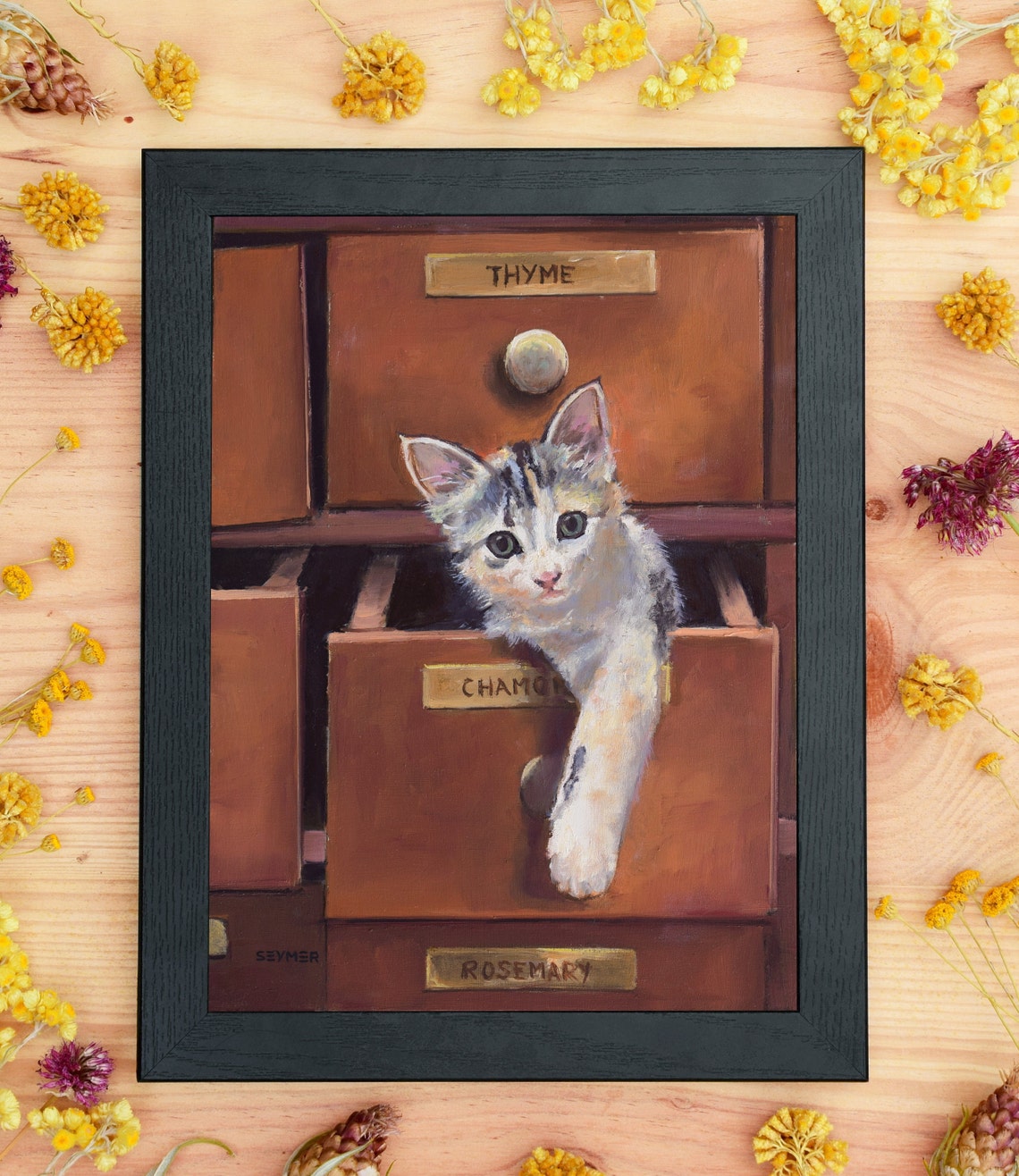 Playful Kitten Climbing Out of Vintage Herb Cabinet Drawers Poster - Image 3