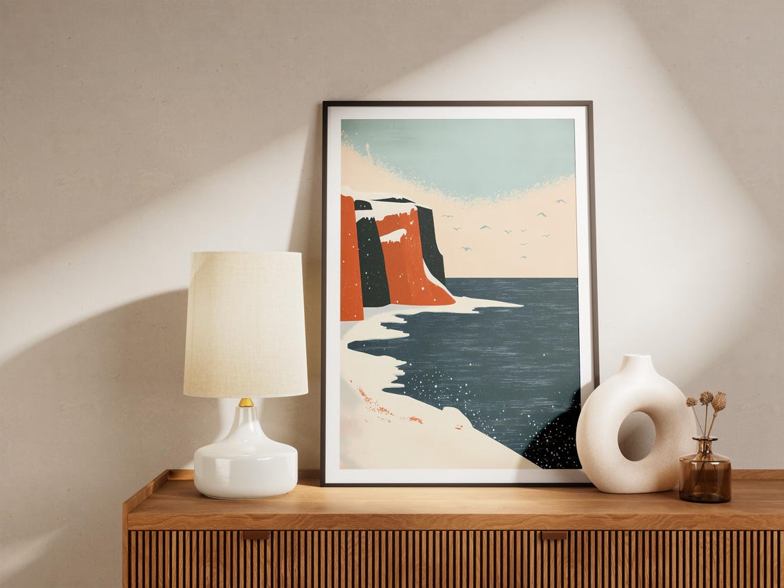 Snowy Orange Cliffs Above a Dark Winter Sea Minimalist Poster - Image 5