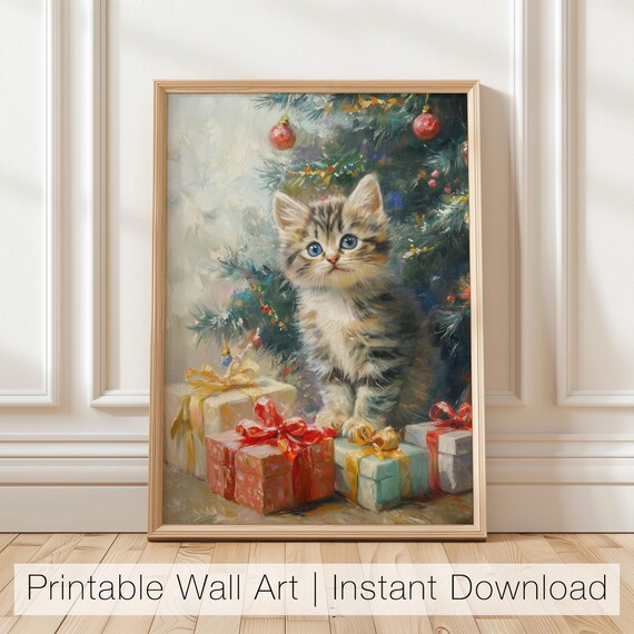 Cute Blue-Eyed Tabby Kitten by a Christmas Tree With Presents Poster