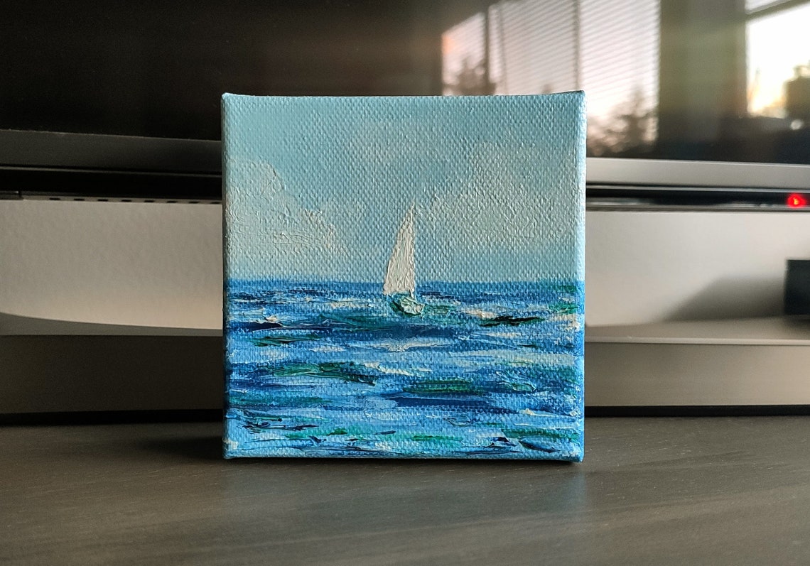 Lone Sailboat On Calm Blue Sea Under Soft Pale Sky Nautical Art Poster