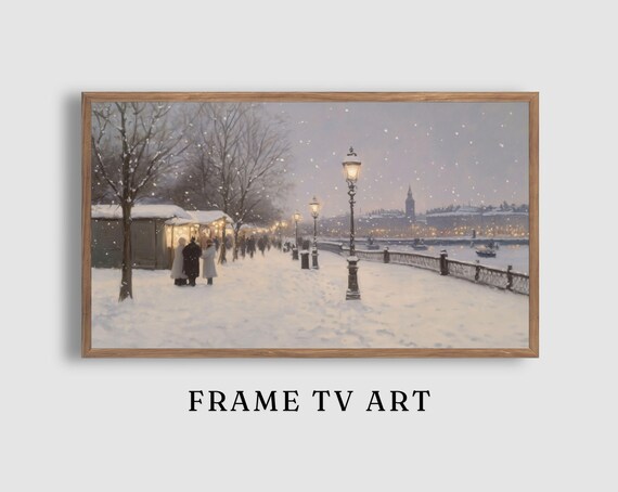 Snowy Riverside Promenade Lampposts Distant City Lights Poster