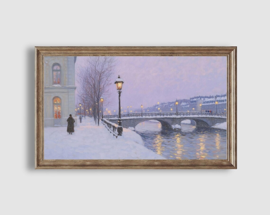 Snowy River Bridge with Glowing Lampposts and Riverside Building Painting Poster - Image 2