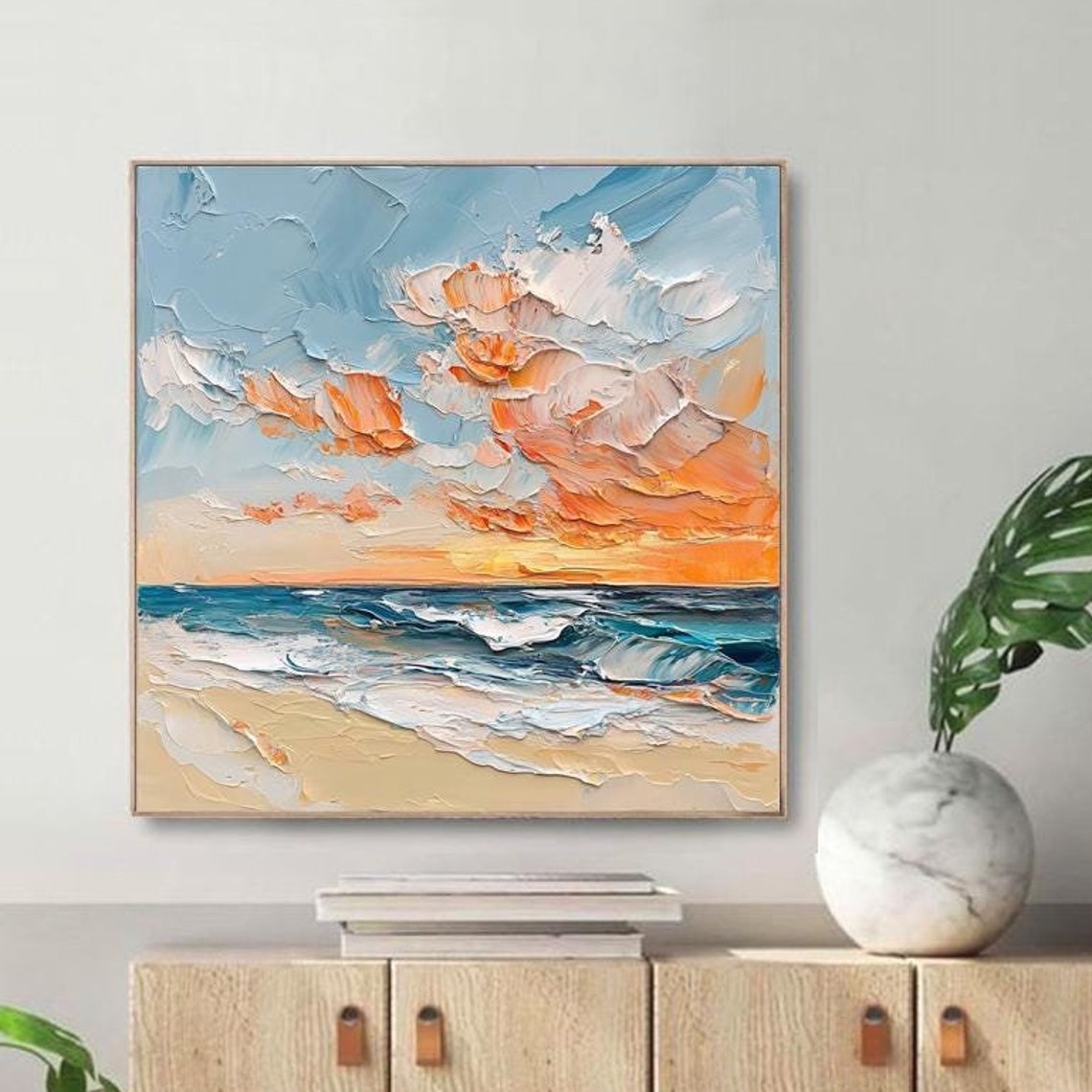 Orange Sunset Clouds Drifting Over a Turquoise Ocean Shore Poster