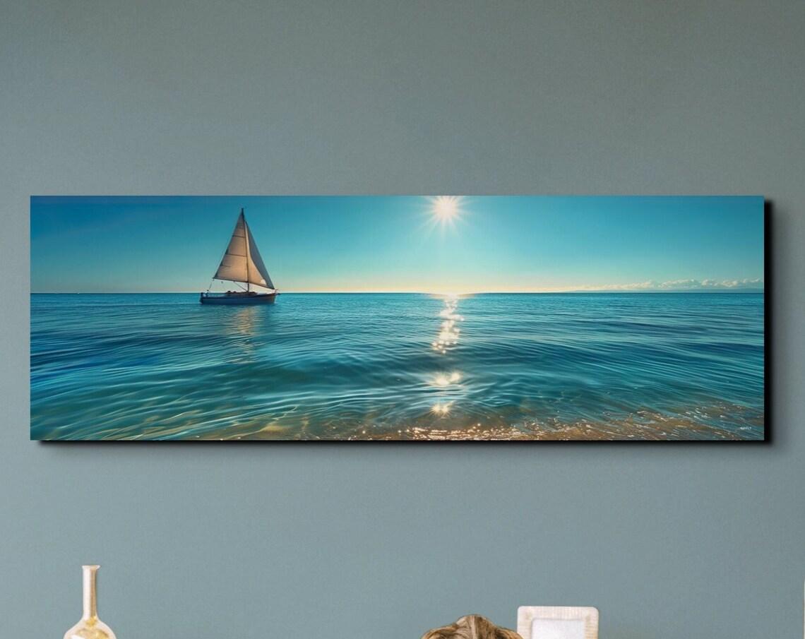 Serene Lone Sailboat Gliding Over a Calm Sunlit Blue Ocean Poster